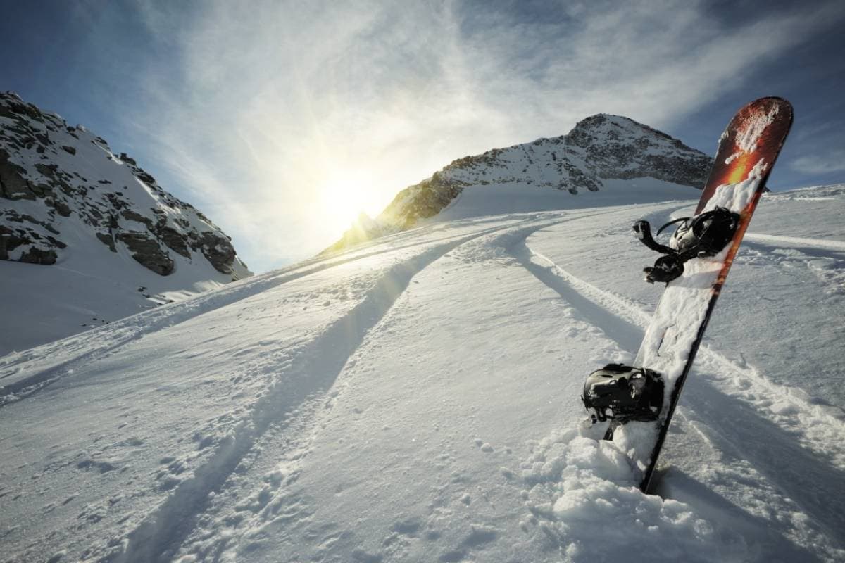 Snowboard in fresh snow